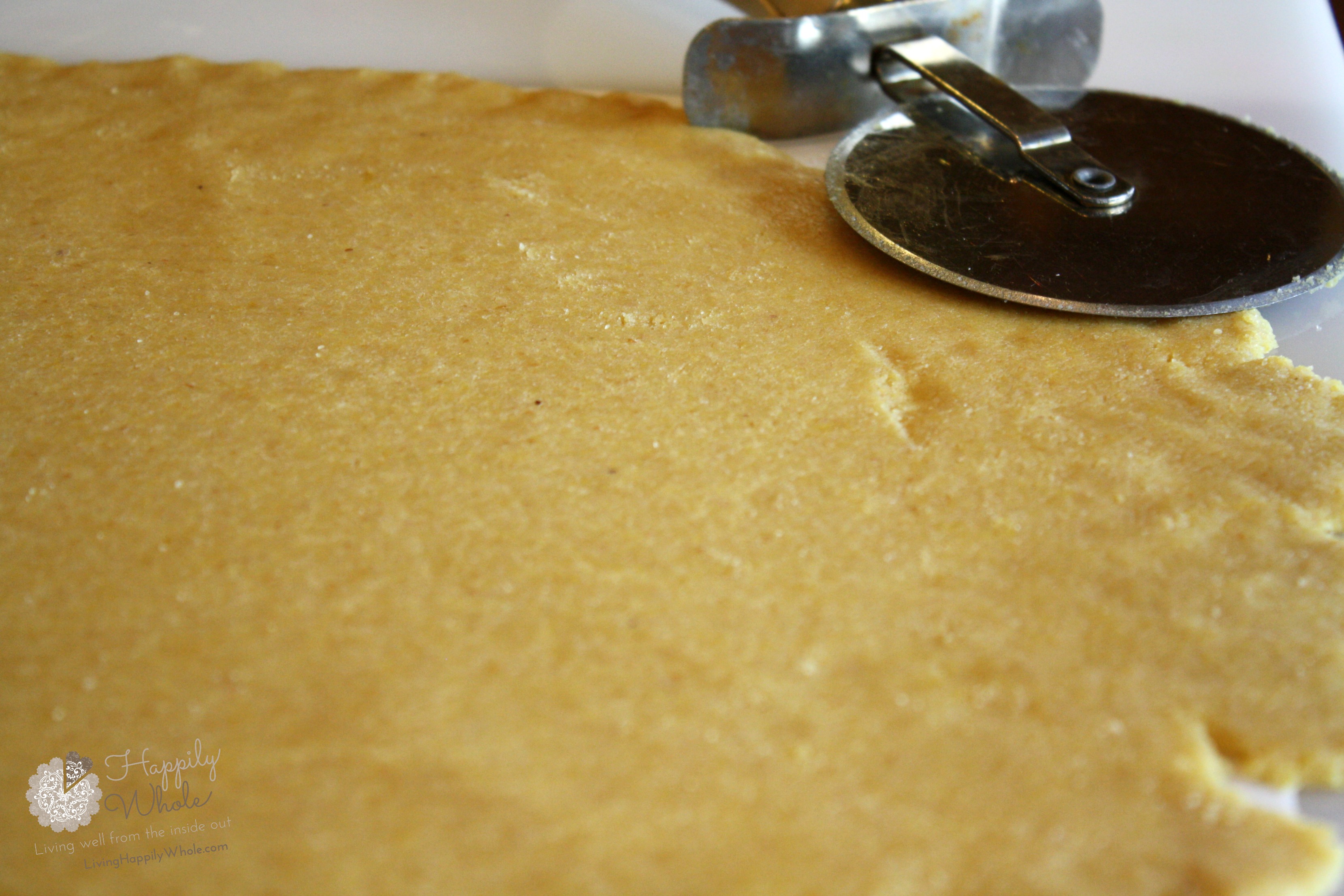 Easy Cheesy Crackers, gluten and grain free. Dough rolled out. 