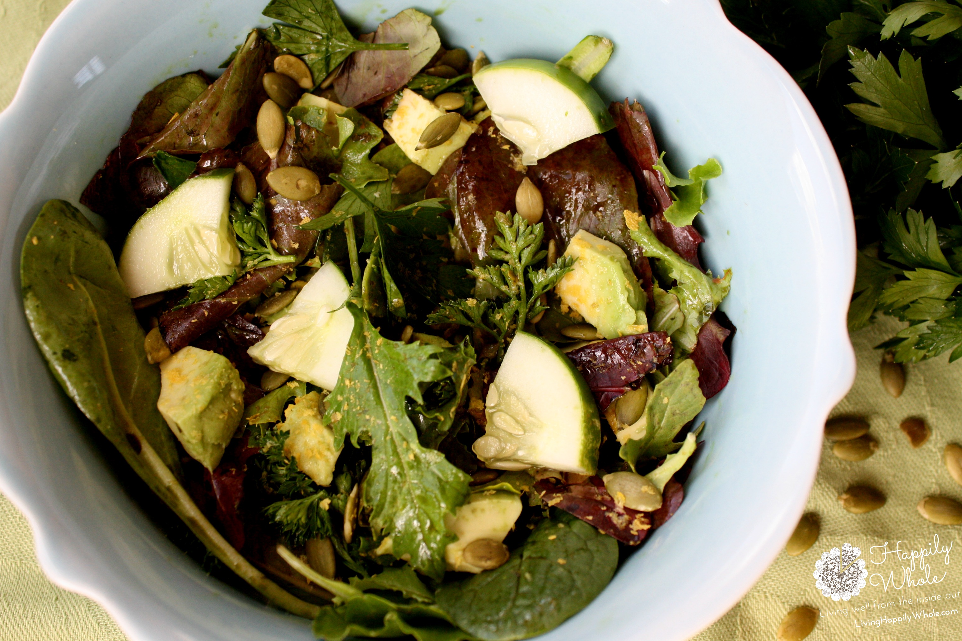 Pumpkin seed, herb, avocado and mixed green salad